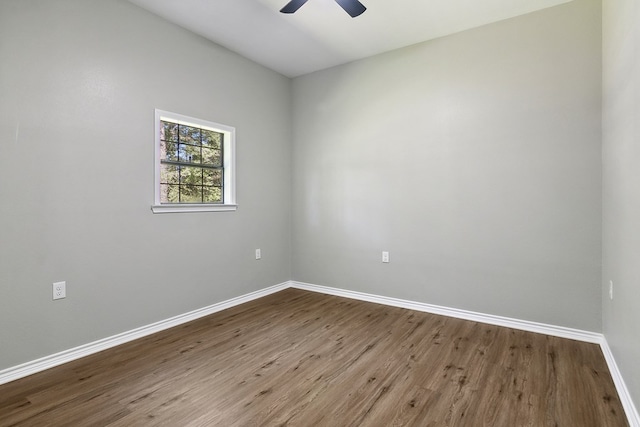 131 Oak Ln, Hemphill, TX 75948 - empty room with wood finished floors, baseboards, and ceiling fan