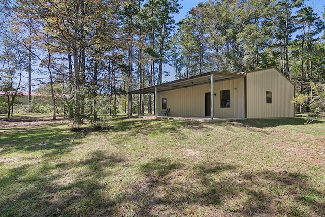 131 Oak Ln, Hemphill, TX 75948 - exterior space with an outdoor structure and a pole building