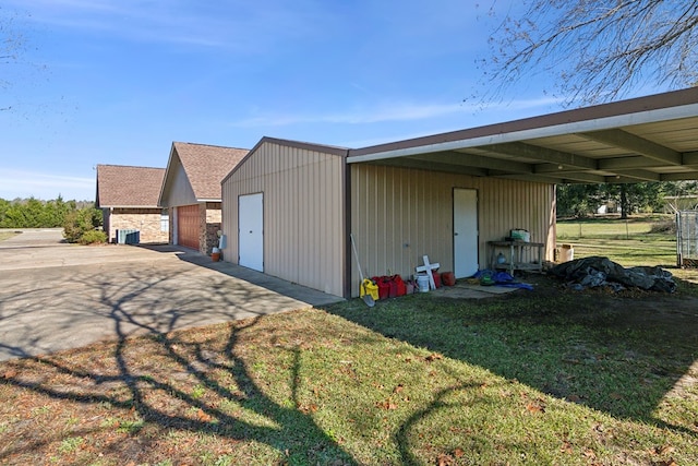 view of outdoor structure featuring a yard