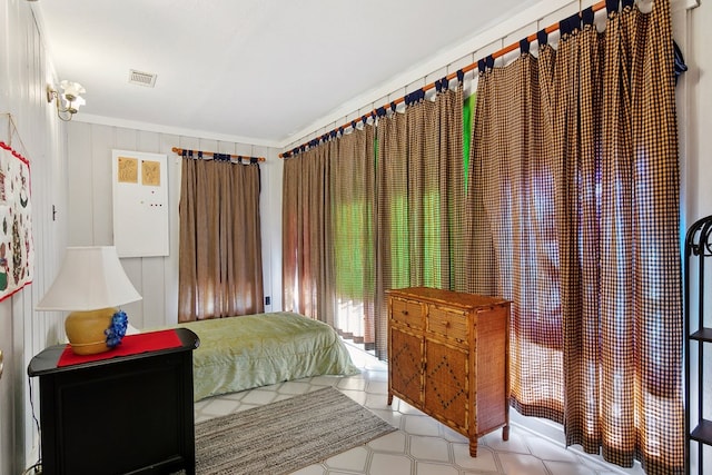 bedroom featuring ornamental molding