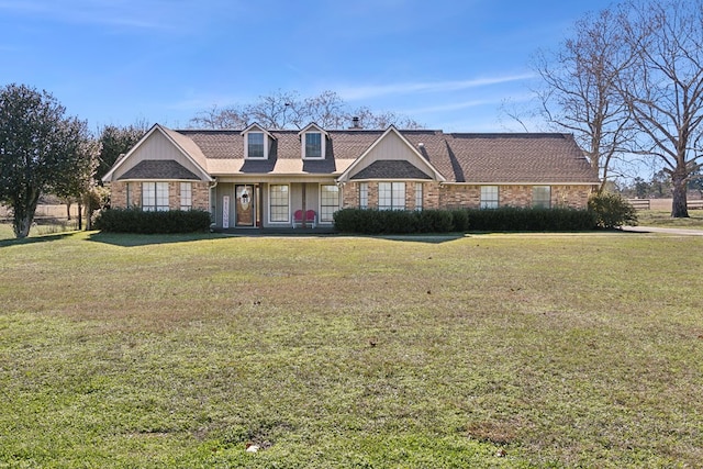 view of front of property with a front lawn