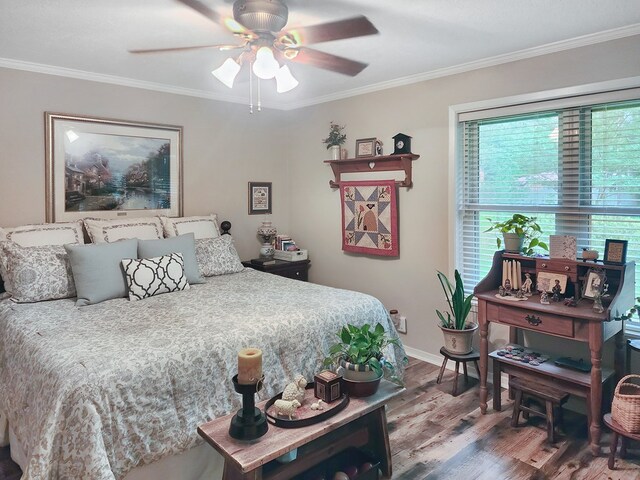 2104 Pinecrest Dr, Jasper, TX 75951 - bedroom featuring wood finished floors, crown molding, and a ceiling fan