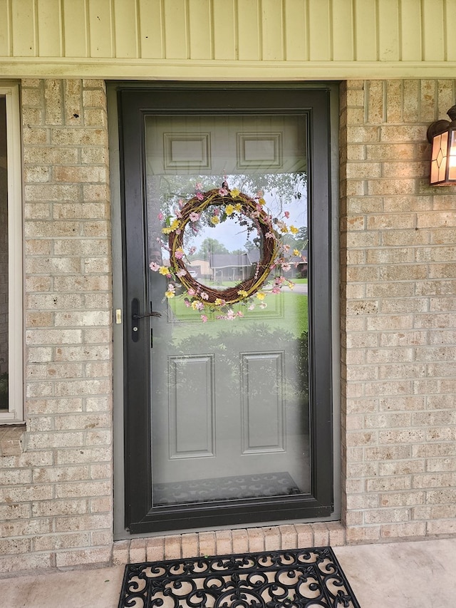 2104 Pinecrest Dr, Jasper, TX 75951 - entrance to property with brick siding and board and batten siding