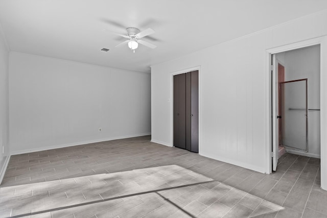 unfurnished bedroom featuring ceiling fan and light wood-type flooring