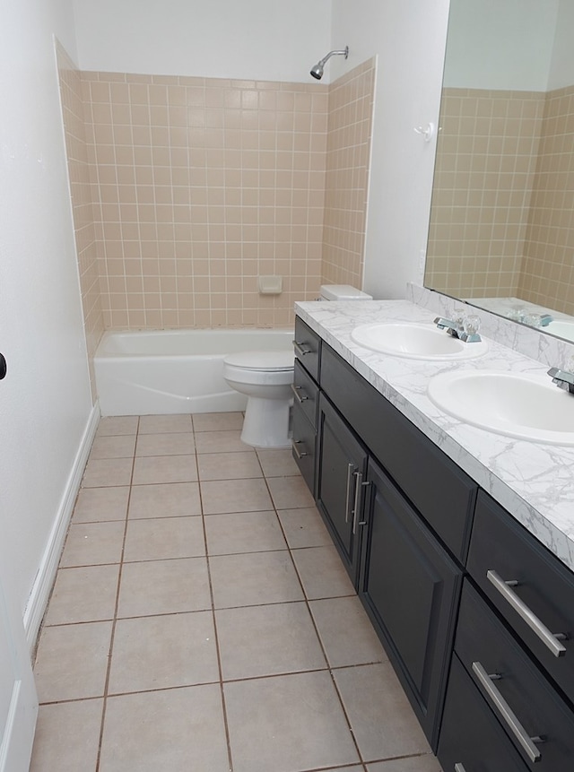 157 Sandalwood, Lufkin, TX 75904 - full bath featuring tile patterned floors, double vanity, bathing tub / shower combination, and toilet