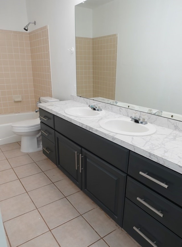 157 Sandalwood, Lufkin, TX 75904 - bathroom with double vanity, tile patterned flooring, shower / bathtub combination, and toilet