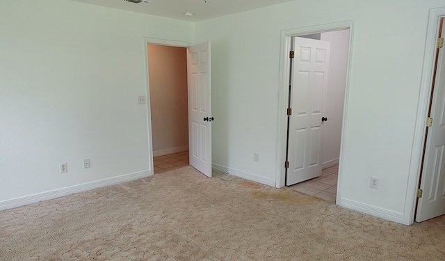 157 Sandalwood, Lufkin, TX 75904 - unfurnished bedroom featuring carpet and baseboards