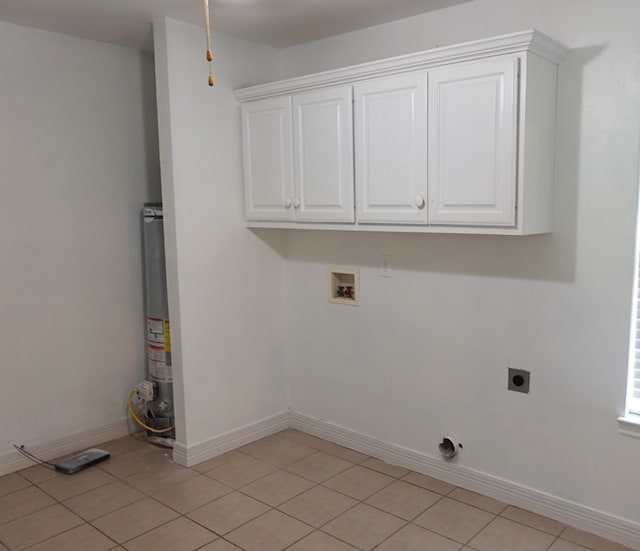 157 Sandalwood, Lufkin, TX 75904 - laundry area with electric dryer hookup, washer hookup, water heater, and light tile patterned floors