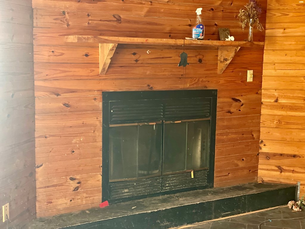 room details featuring wooden walls