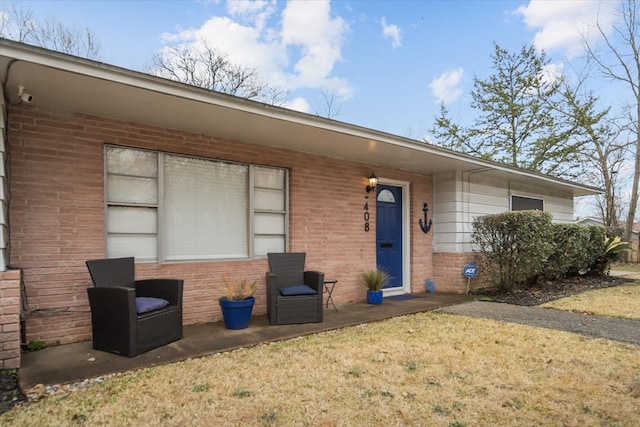 408 Bob St, Lufkin, TX 75904 - entrance to property with a lawn and brick siding