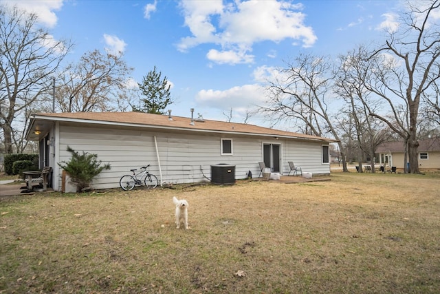 408 Bob St, Lufkin, TX 75904 - back of house with a lawn and central AC unit