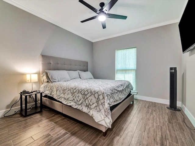 bedroom featuring crown molding and ceiling fan