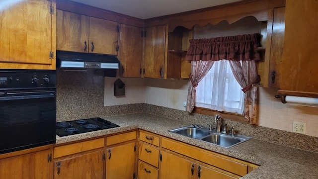 kitchen with black appliances and sink