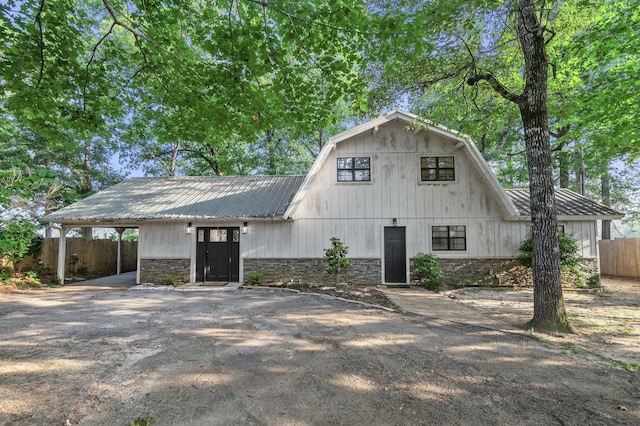 view of front of property with a carport