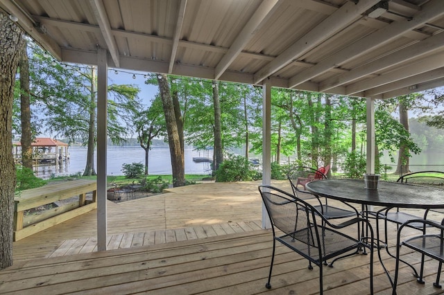 wooden deck with a water view