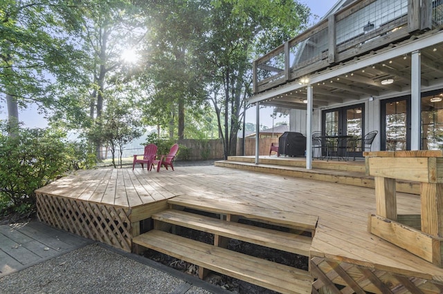 wooden deck featuring grilling area