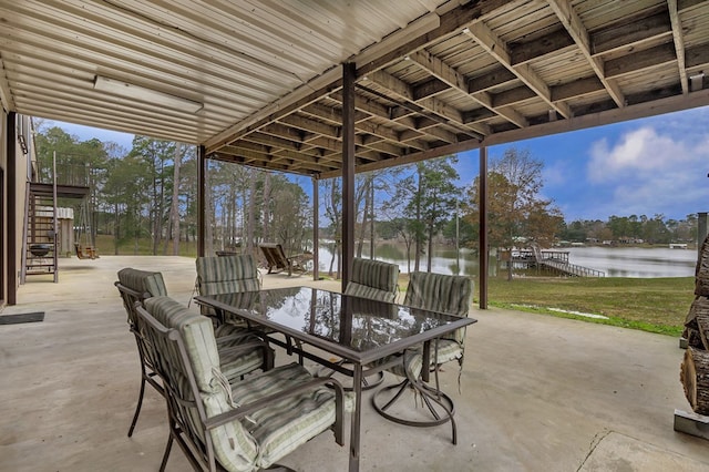 view of patio featuring a water view