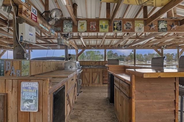 view of horse barn featuring beverage cooler