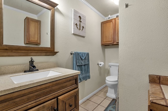 bathroom featuring tile patterned floors, ornamental molding, toilet, and vanity