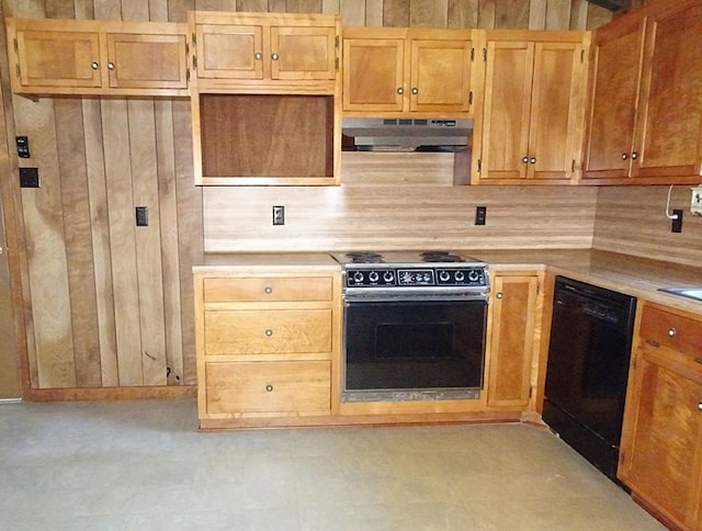 kitchen featuring wood walls, dishwasher, electric range oven, and light brown cabinets