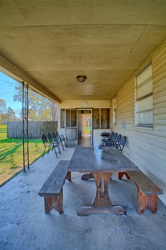 view of patio / terrace featuring fence