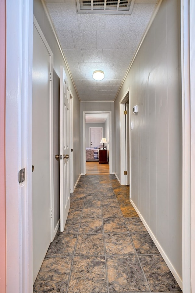 hallway featuring visible vents