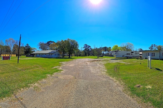 view of street featuring driveway