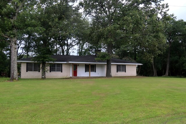 11774 US Highway 69 S, Huntington, TX 75949 - ranch-style home with a front lawn and brick siding