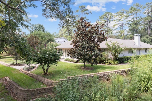 exterior space with a front yard