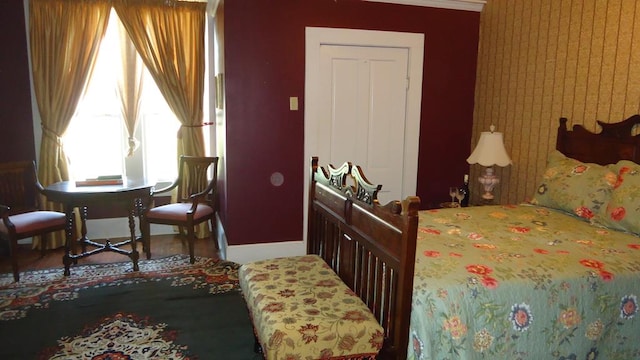 110 Market St, Hemphill, TX 75948 - bedroom with baseboards and wallpapered walls