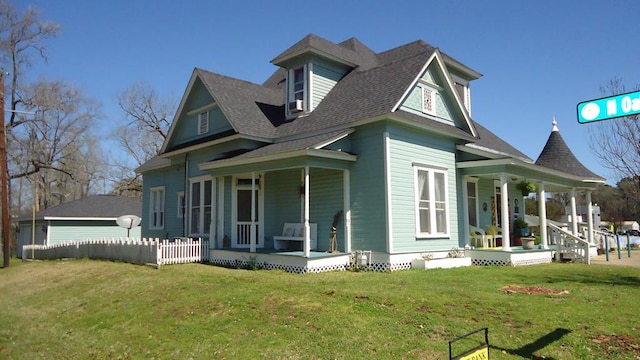 110 Market St, Hemphill, TX 75948 - view of side of property with a porch, a yard, and roof with shingles