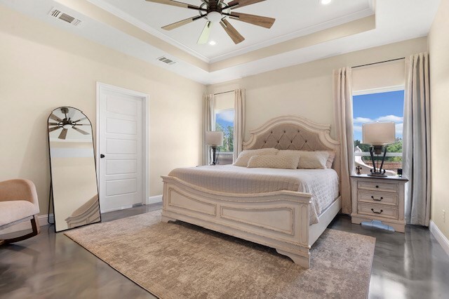 685 Box Car Rd, Lufkin, TX 75904 - bedroom with a tray ceiling, ornamental molding, baseboards, recessed lighting, and a ceiling fan