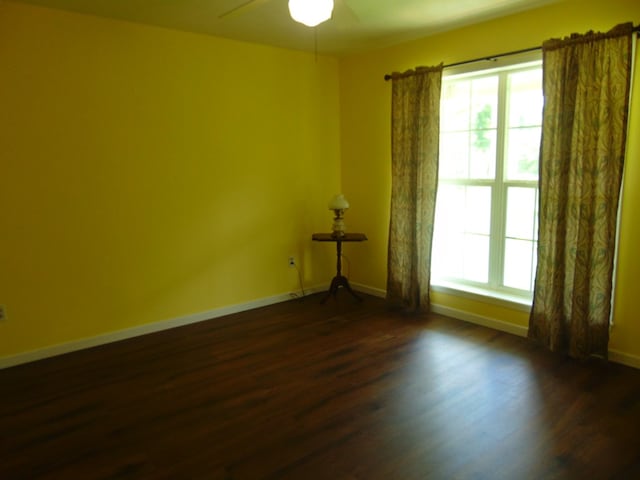3198 Old Union Rd, Lufkin, TX 75904 - unfurnished room featuring dark wood-type flooring and a ceiling fan