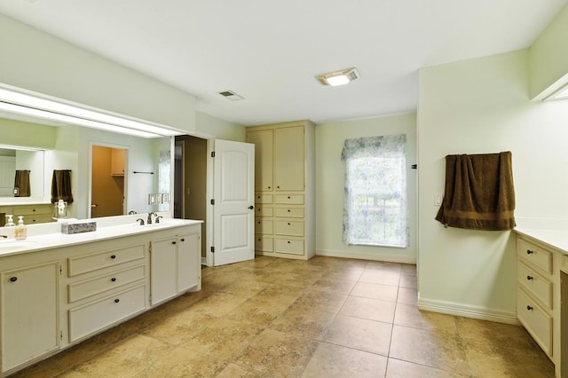 3198 Old Union Rd, Lufkin, TX 75904 - bathroom featuring double vanity and baseboards