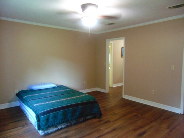 3198 Old Union Rd, Lufkin, TX 75904 - bedroom featuring crown molding, wood finished floors, and a ceiling fan