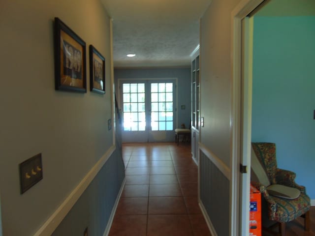 3198 Old Union Rd, Lufkin, TX 75904 - corridor with dark tile patterned flooring, recessed lighting, and french doors
