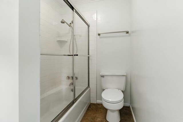 3198 Old Union Rd, Lufkin, TX 75904 - bathroom featuring combined bath / shower with glass door and tile patterned flooring