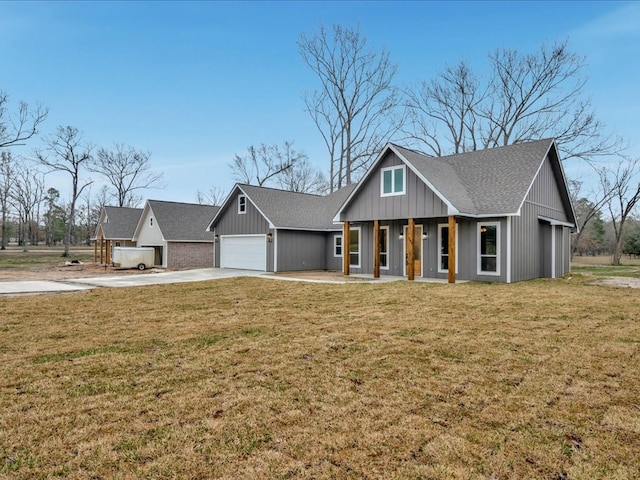 282 Lancewood Dr, Lufkin, TX 75904 - modern farmhouse style home with concrete driveway, a front lawn, a shingled roof, covered porch, and an attached garage