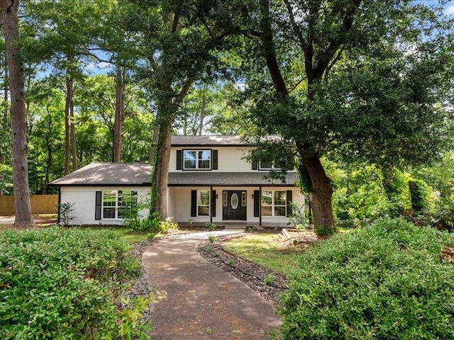 3202 Chimney Rock Ln, Nacogdoches, TX 75965 - traditional home featuring a porch and concrete driveway