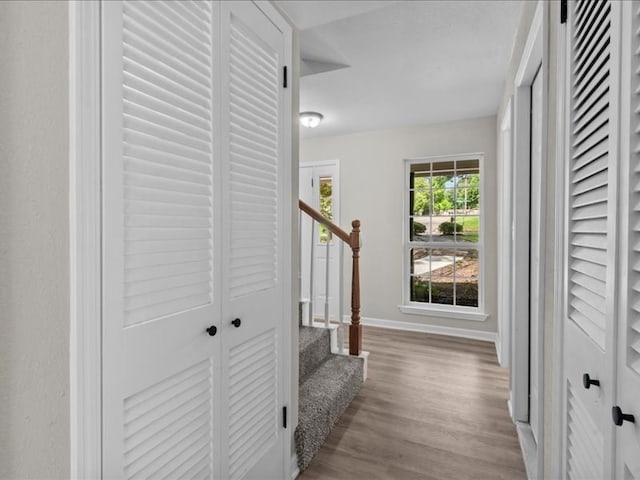 3202 Chimney Rock Ln, Nacogdoches, TX 75965 - hallway with wood finished floors and stairway
