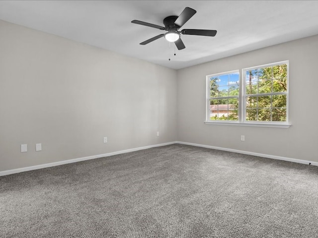 3202 Chimney Rock Ln, Nacogdoches, TX 75965 - carpeted spare room featuring baseboards and ceiling fan