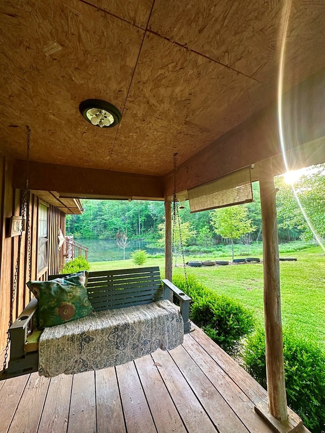 785 County Road 105, San Augustine, TX 75972 - wooden deck featuring a yard