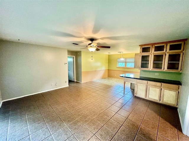 kitchen featuring tile patterned floors and ceiling fan