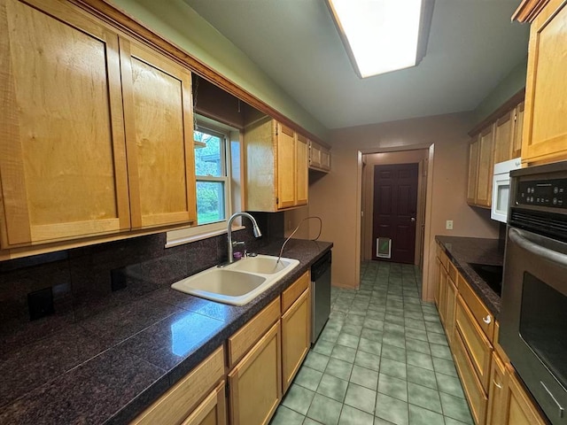 kitchen featuring decorative backsplash, sink, and stainless steel appliances