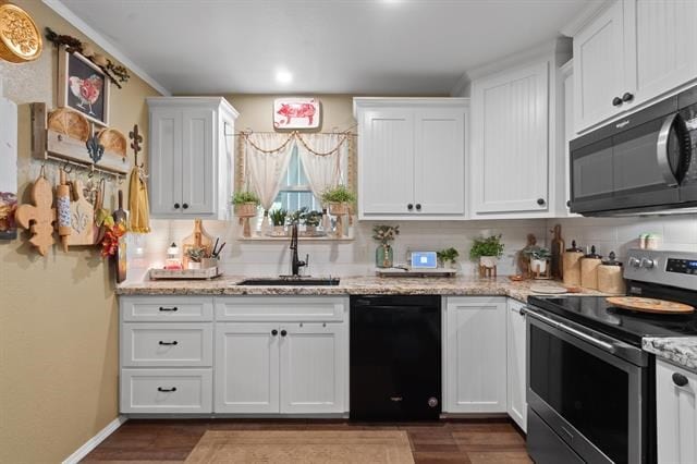 kitchen featuring white cabinets, backsplash, dishwasher, electric stove, and a sink