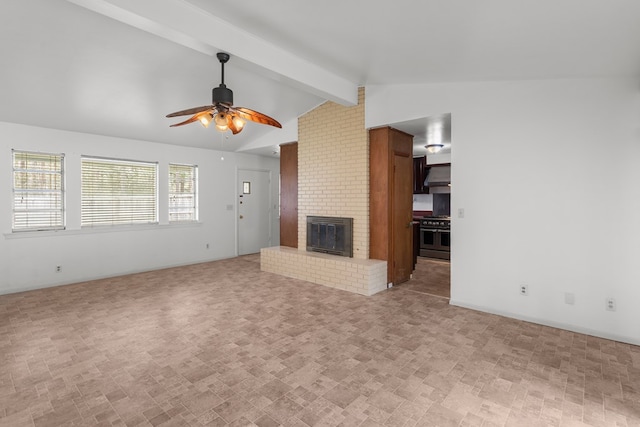 unfurnished living room featuring vaulted ceiling with beams, ceiling fan, and a fireplace