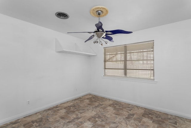 spare room featuring ceiling fan