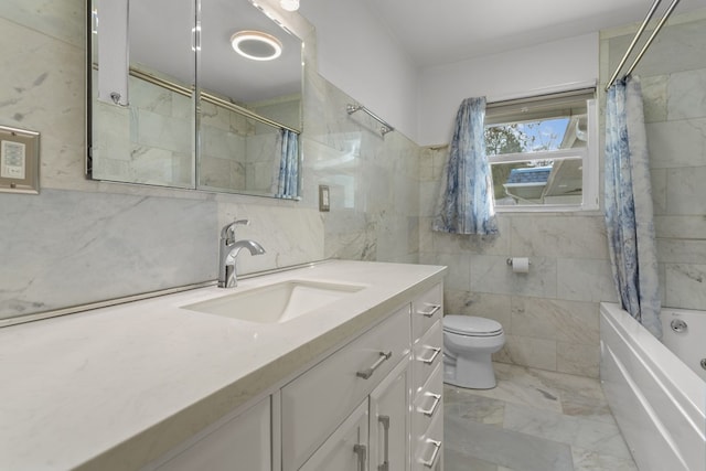 full bathroom featuring shower / bath combination with curtain, vanity, toilet, and tile walls