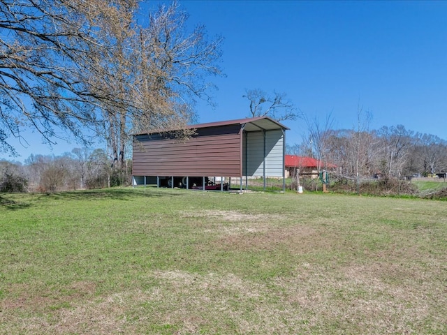 view of outdoor structure with a detached carport