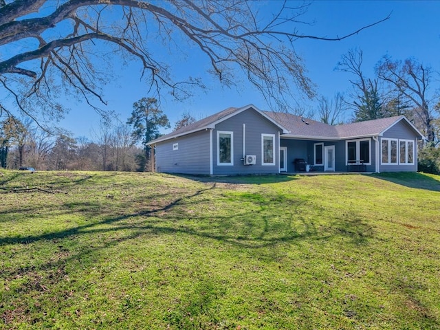 view of front of property with a front lawn